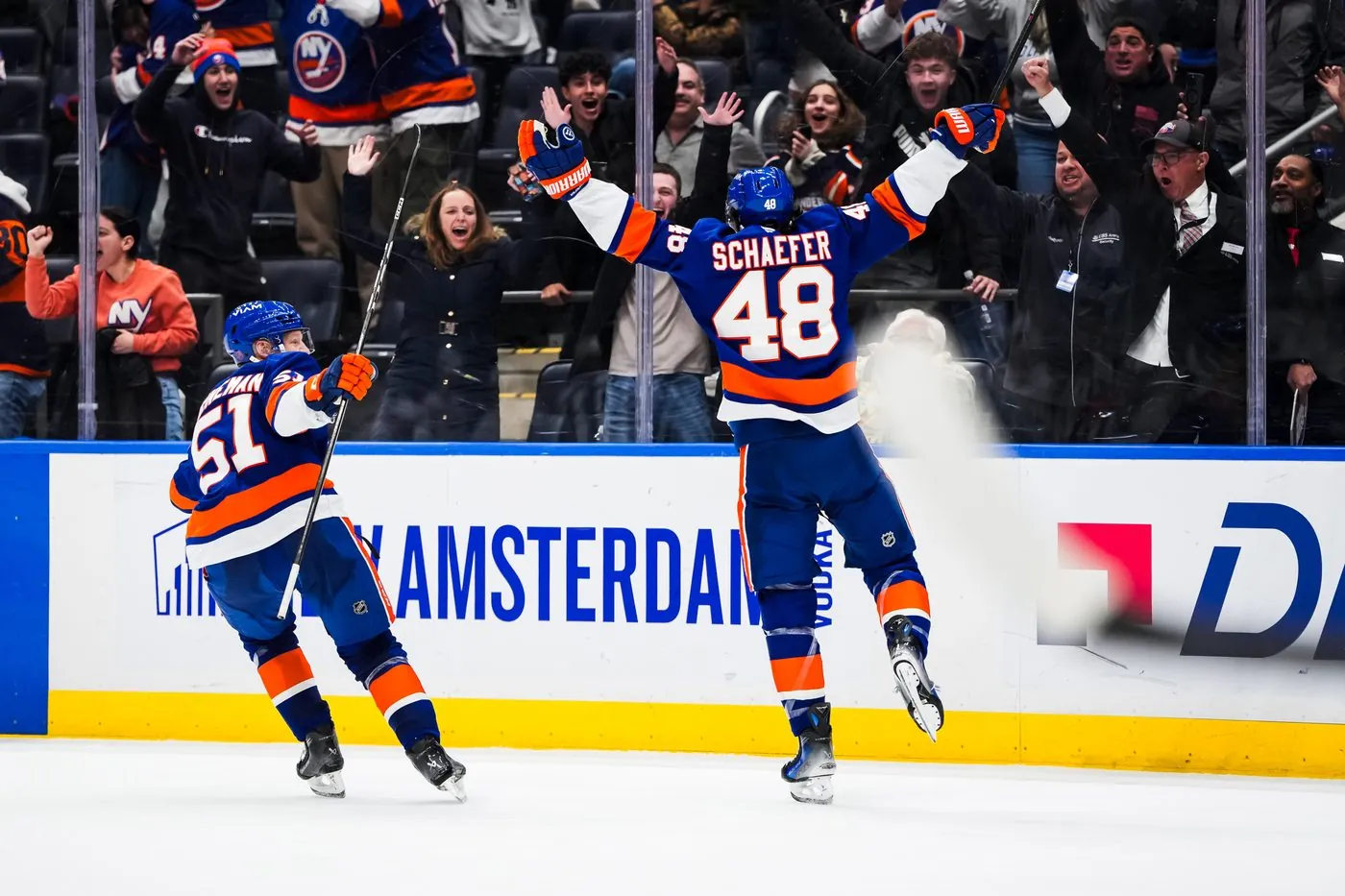 Sports photographer capturing fast-paced NHL action in New York